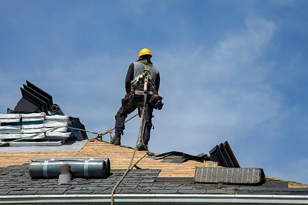 Professional Roofing technician working in Blue River, OR